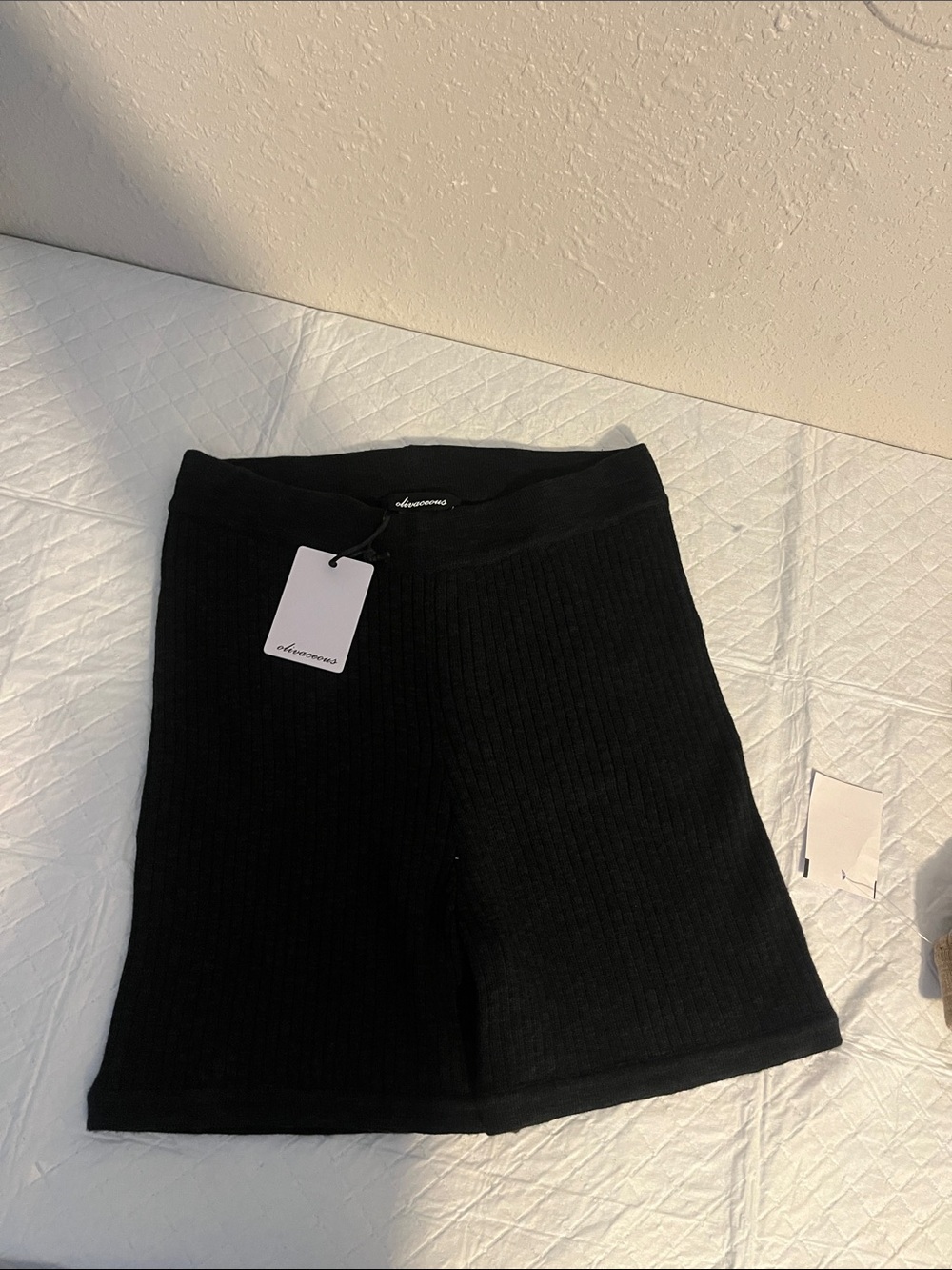 Olivaceous Black Ribbed Mini Skirt